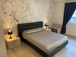 Voodi või voodid majutusasutuse Emilius Suite toas