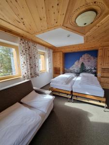 Postel nebo postele na pokoji v ubytování Hotel Borest