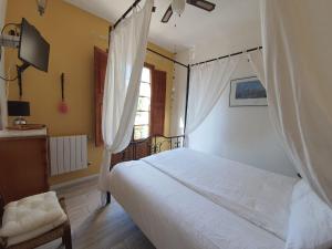 Postel nebo postele na pokoji v ubytování CasaDesigual