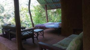 Area soggiorno di Chalet in the Jungle