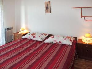 Posteľ alebo postele v izbe v ubytovaní house Divna