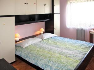 Posteľ alebo postele v izbe v ubytovaní house Divna