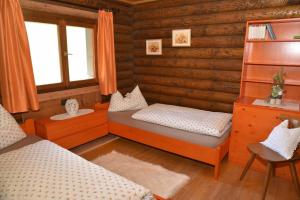 Postel nebo postele na pokoji v ubytování Berghütte Ahrntal