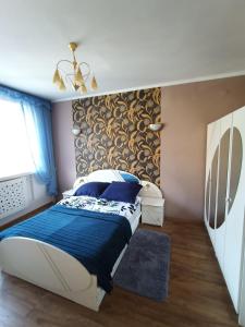 Postel nebo postele na pokoji v ubytování Apartamenty na skarpie