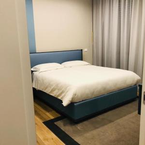 Postel nebo postele na pokoji v ubytování Royal Suite