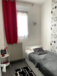 Postel nebo postele na pokoji v ubytování Ti Gwenn