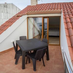 A balcony or terrace at Apartamentos turisticos HAZ AMIGO