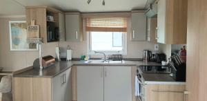 Fotografie z fotogalerie ubytování Lakeside Cotswold Holiday Home v destinaci Cirencester