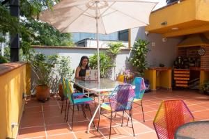 Restaurace v ubytování Malaika Hostel Medellín