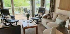 Fotografie z fotogalerie ubytování Lakeside Cotswold Holiday Home v destinaci Cirencester