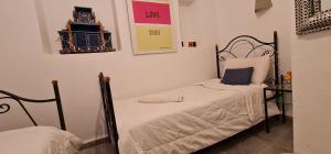 A bed or beds in a room at Atlantic Hostel