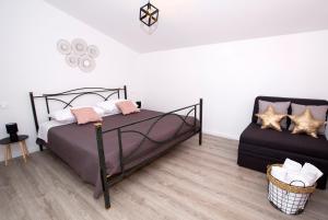 Postel nebo postele na pokoji v ubytování Apartment Maya Bellissima