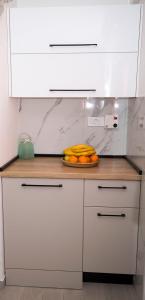 Kuchyň nebo kuchyňský kout v ubytování Apartment Maya Bellissima