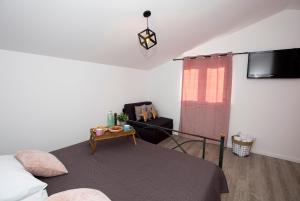 Postel nebo postele na pokoji v ubytování Apartment Maya Bellissima