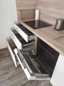 Kuchyňa alebo kuchynka v ubytovaní Apartmán Karolína