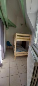 a bedroom with two bunk beds in a room at Appartement TROUMOUSE Résidence Les 3 Cirques in Gèdre