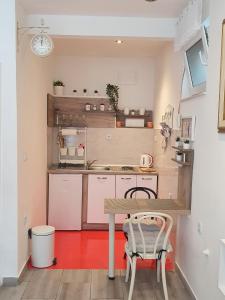 Kuchyň nebo kuchyňský kout v ubytování Studio Apartment CONTE Split
