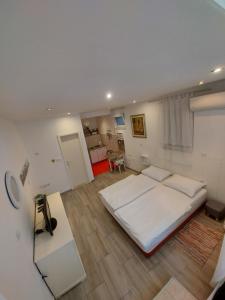 Postel nebo postele na pokoji v ubytování Studio Apartment CONTE Split + 21 fotografií