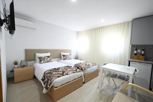 Postel nebo postele na pokoji v ubytování O Visconde - Alojamento local