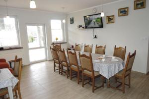 Televízia a/alebo spoločenská miestnosť v ubytovaní Holiday Home in Kolczewo with Terrace