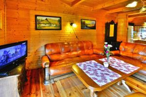 Posezení v ubytování Holiday Home in Swiecianowo near Lake Beach + 17 fotografií