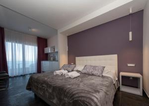 Luxury rooms Beach Mediteran客房内的一张或多张床位