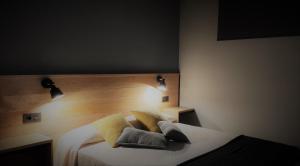 Un pat sau paturi într-o cameră la Prao del Molin