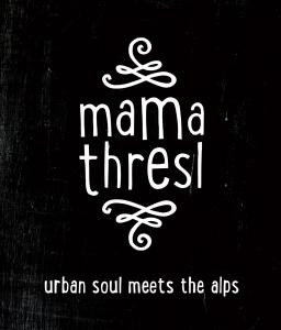 a sign with the words mana treesufaru soul meets the arts at mama thresl in Leogang