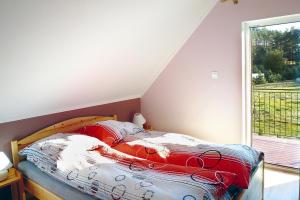 Posteľ alebo postele v izbe v ubytovaní Holiday home for 10 people, close to the lake