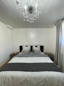 Ένα ή περισσότερα κρεβάτια σε δωμάτιο στο Apartment am Wasserfall mit Sauna & Top-Lage