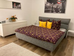 Ένα ή περισσότερα κρεβάτια σε δωμάτιο στο Ferienwohnung Passau