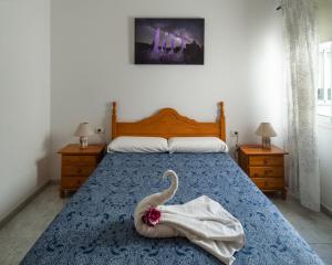 Postel nebo postele na pokoji v ubytování Apartamentos Leomar II