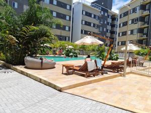 Bazén v ubytování Paradaise Resort Ubatuba nebo v jeho okolí