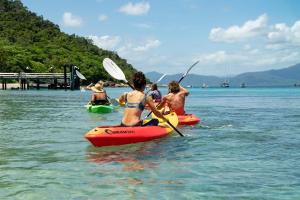 
people on a raft in the water at Fitzroy Island Resort in Fitzroy Island
