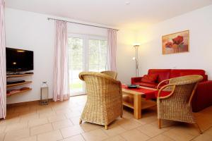 A seating area at Holiday home in Zirchow