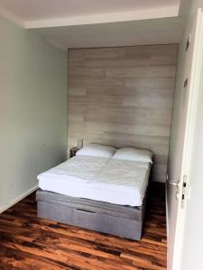 Postel nebo postele na pokoji v ubytování Puschkin Rooms