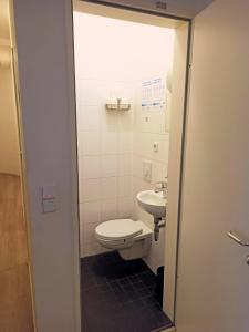 Koupelna v ubytování Puschkin Rooms