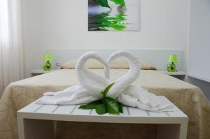 Postel nebo postele na pokoji v ubytování Bed Happy