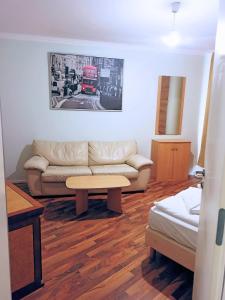 Postel nebo postele na pokoji v ubytování Puschkin Rooms
