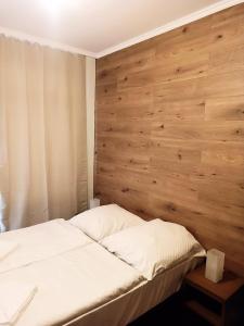 Postel nebo postele na pokoji v ubytování Puschkin Rooms