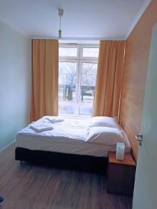 Postel nebo postele na pokoji v ubytování Puschkin Rooms