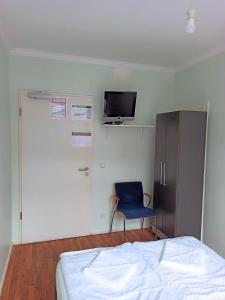 TV a/nebo společenská místnost v ubytování Puschkin Rooms