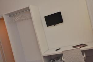 TV a/nebo společenská místnost v ubytování Bed Happy