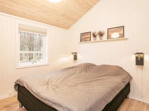 Postel nebo postele na pokoji v ubytování Holiday home Jerup XLVIII