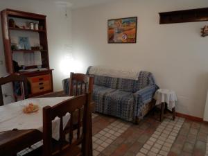 a living room with a couch and a table at Calì B&B in Alatri