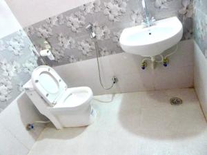 Koupelna v ubytování Hotel Grace