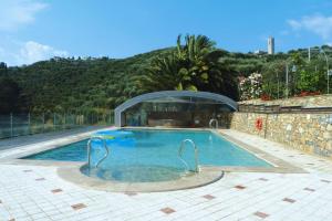 Swimmingpoolen hos eller tæt på Villa, Massarosa