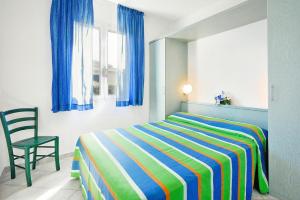 Ένα ή περισσότερα κρεβάτια σε δωμάτιο στο Villa in Cecina Mare near Sandy Beaches