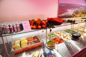 a buffet filled with different types of food and drinks at Tehvandi Hotell in Otepää