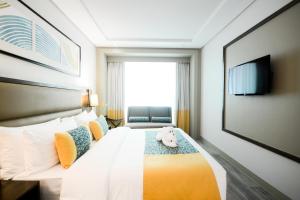 TV a/nebo společenská místnost v ubytování Belmont Hotel Boracay